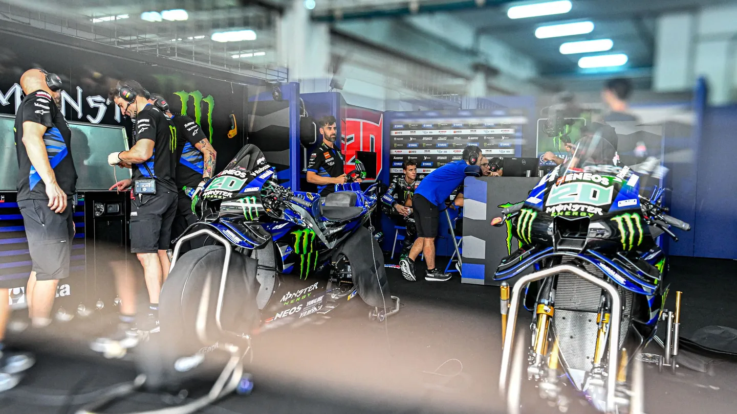 Crew Working In Factory Yamaha Team Motogp Pit Box